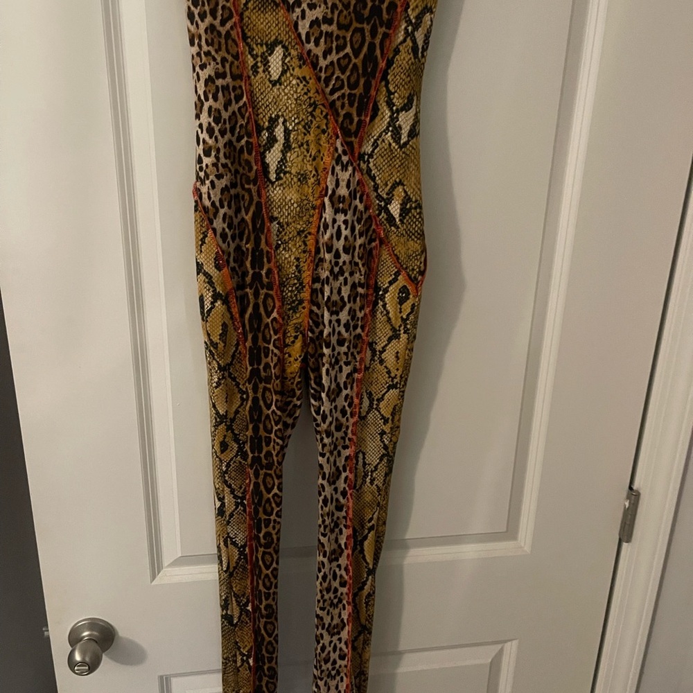 New Fashion Nova strapless, body-conscious animal, print jumpsuit/cat suit.
